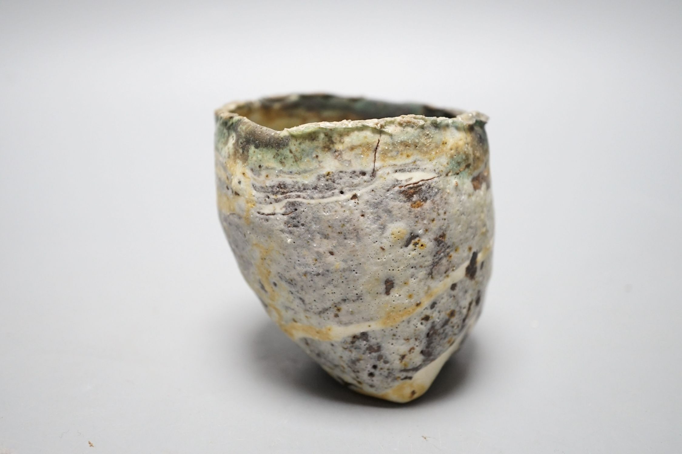 Ewen Henderson (1934-2000), a hand-built mixed laminated clay unomi, 8.5cm tall